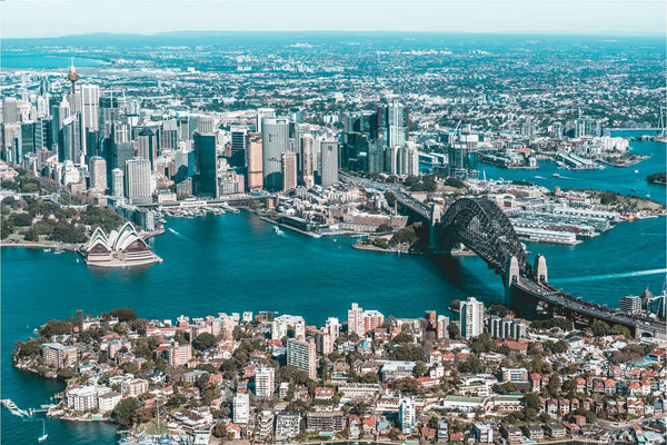 Aerial view of Sydney CBD with harbour bridge and opera house. Looking at Sydney CBD from the north down to the south