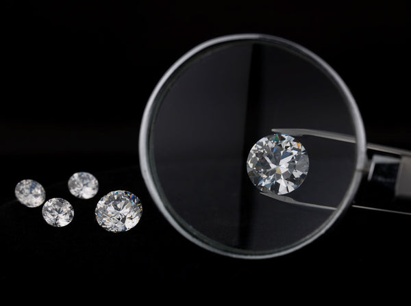 Just Gold Jewellery - Magnifying Glass Over Diamond.jpg