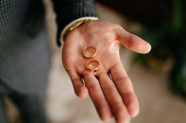 Just Gold Jewellery - Wedding rings on grooms hand
