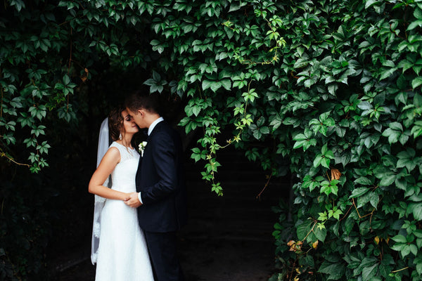 Just Gold Jewellery - beautiful young wedding couple kissing