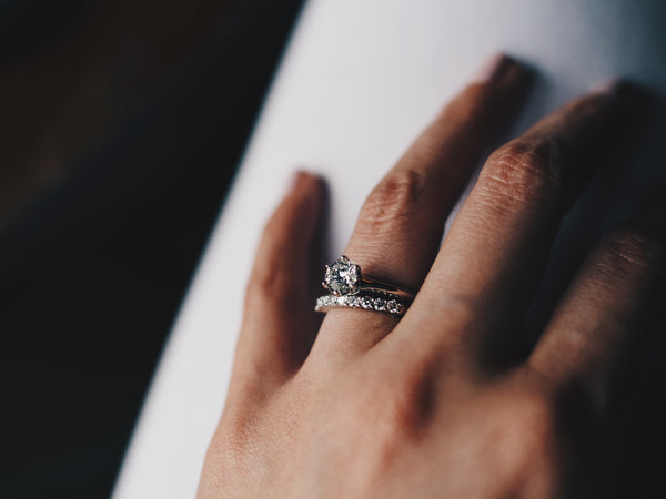 Just Gold Jewellery - close up of woman girl hands wedding ring engagement ring set