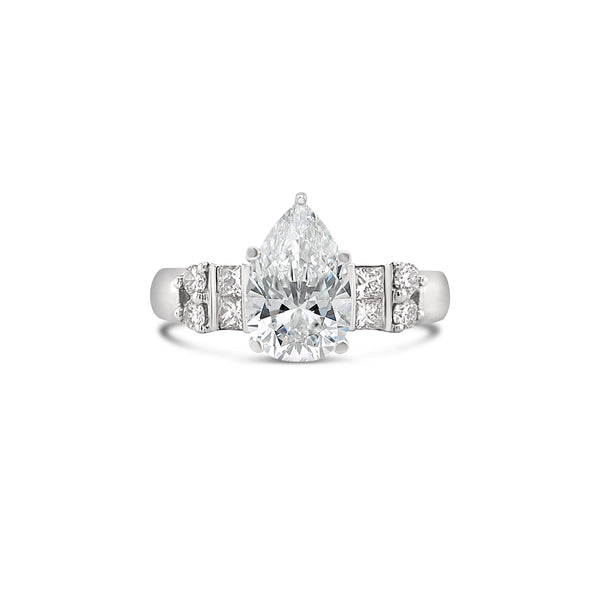 Pear Cut Lab Grown Diamond Engagement Ring With Princess Cut Diamond Side Stones