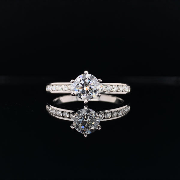 Channel setting engagement ring