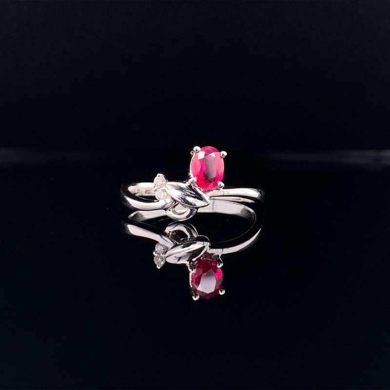 oval ruby diamond ring
