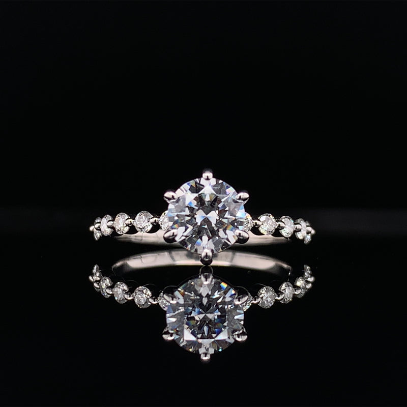 Round Cut Shared Prong Engagement Ring