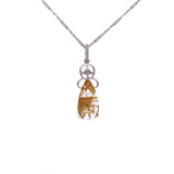 Quartz and diamond pendant
