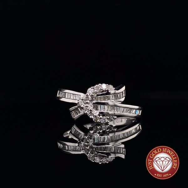 Baguette and round brilliant cut diamond dress ring