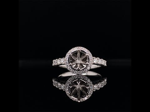 Classic round cut halo engagement ring video