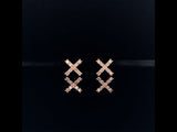 18k rose gold diamond cross earrings video
