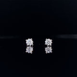 18k white gold four prong diamond stud earrings