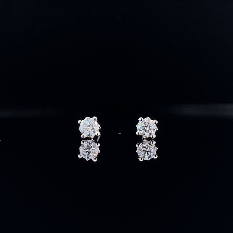 18k white gold four prong diamond stud earrings