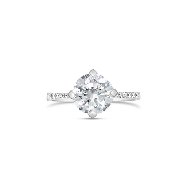 modern four prong round brilliant cut diamond ring