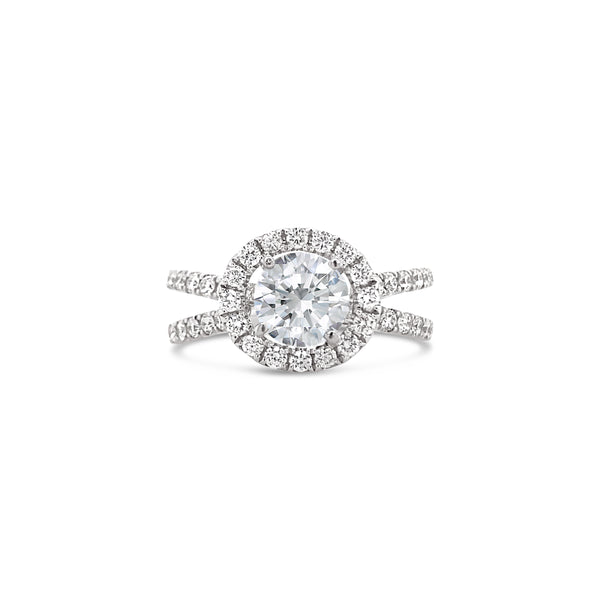 Round halo split shank diamond ring