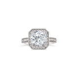 Edged halo round cut diamond ring