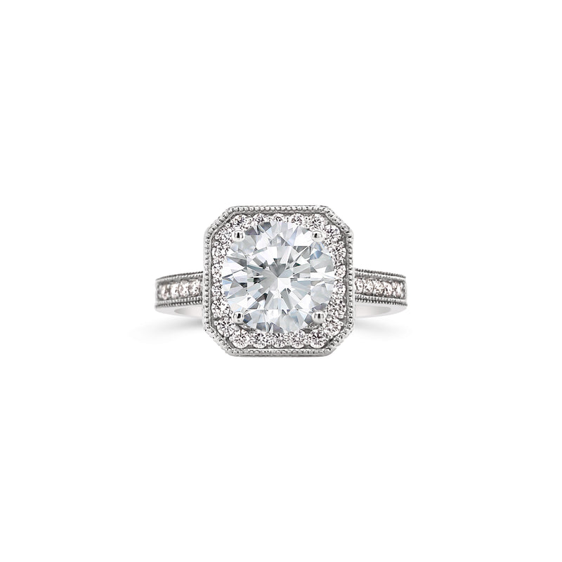 Edged halo round cut diamond ring
